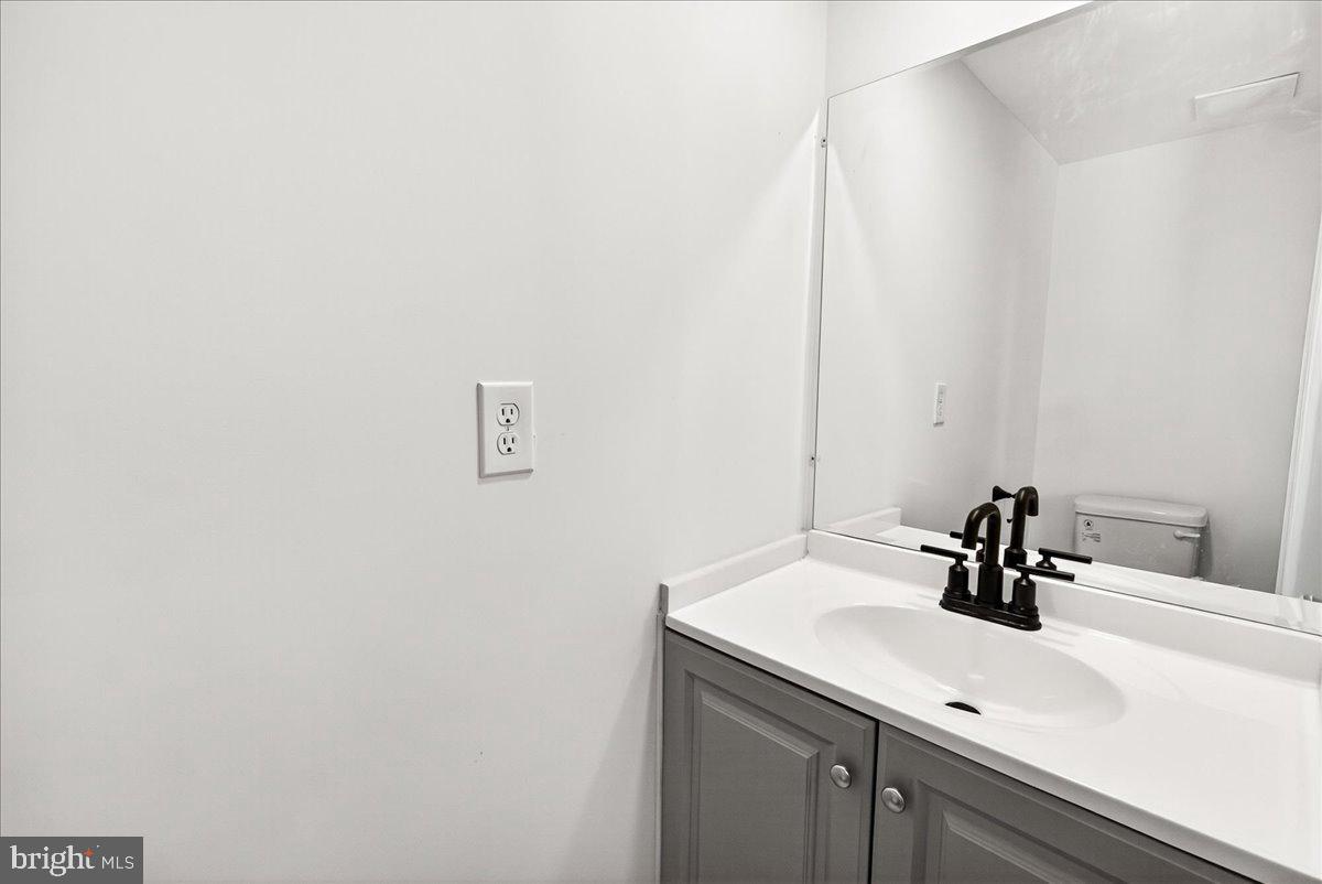 629 Wilson Place Frederick, MD 21702 - Photo 23 of 39 a bathroom with a sink and a mirror