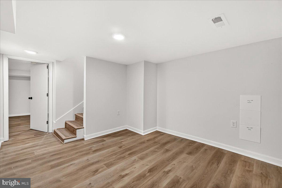 629 Wilson Place Frederick, MD 21702 - Photo 33 of 39 a view of empty room with wooden floor