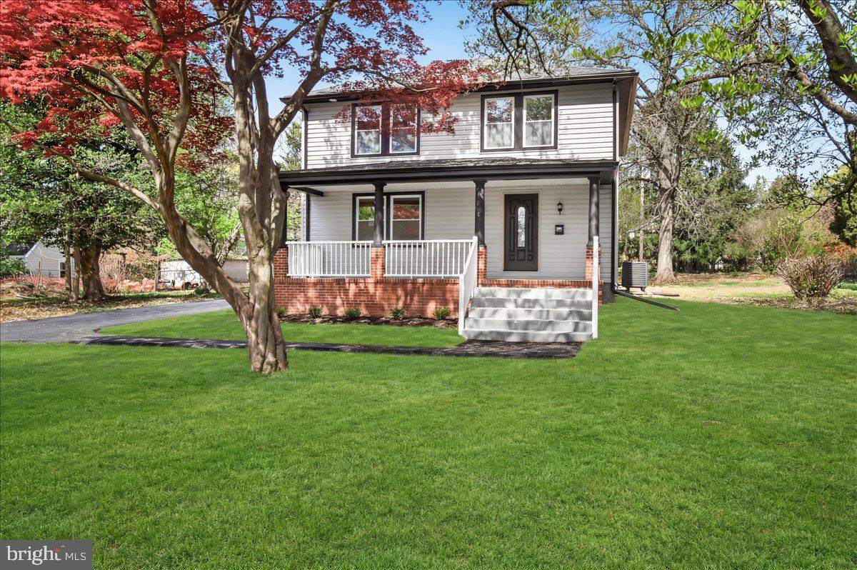 629 Wilson Place Frederick, MD 21702 - Photo 4 of 54 photo is staged with green grass