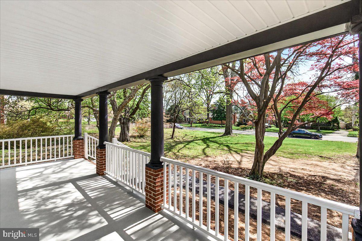 629 Wilson Place Frederick, MD 21702 - Photo 8 of 39 a view of a porch with wooden floor and outdoor space