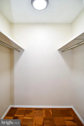 a view of gallery with wooden floor