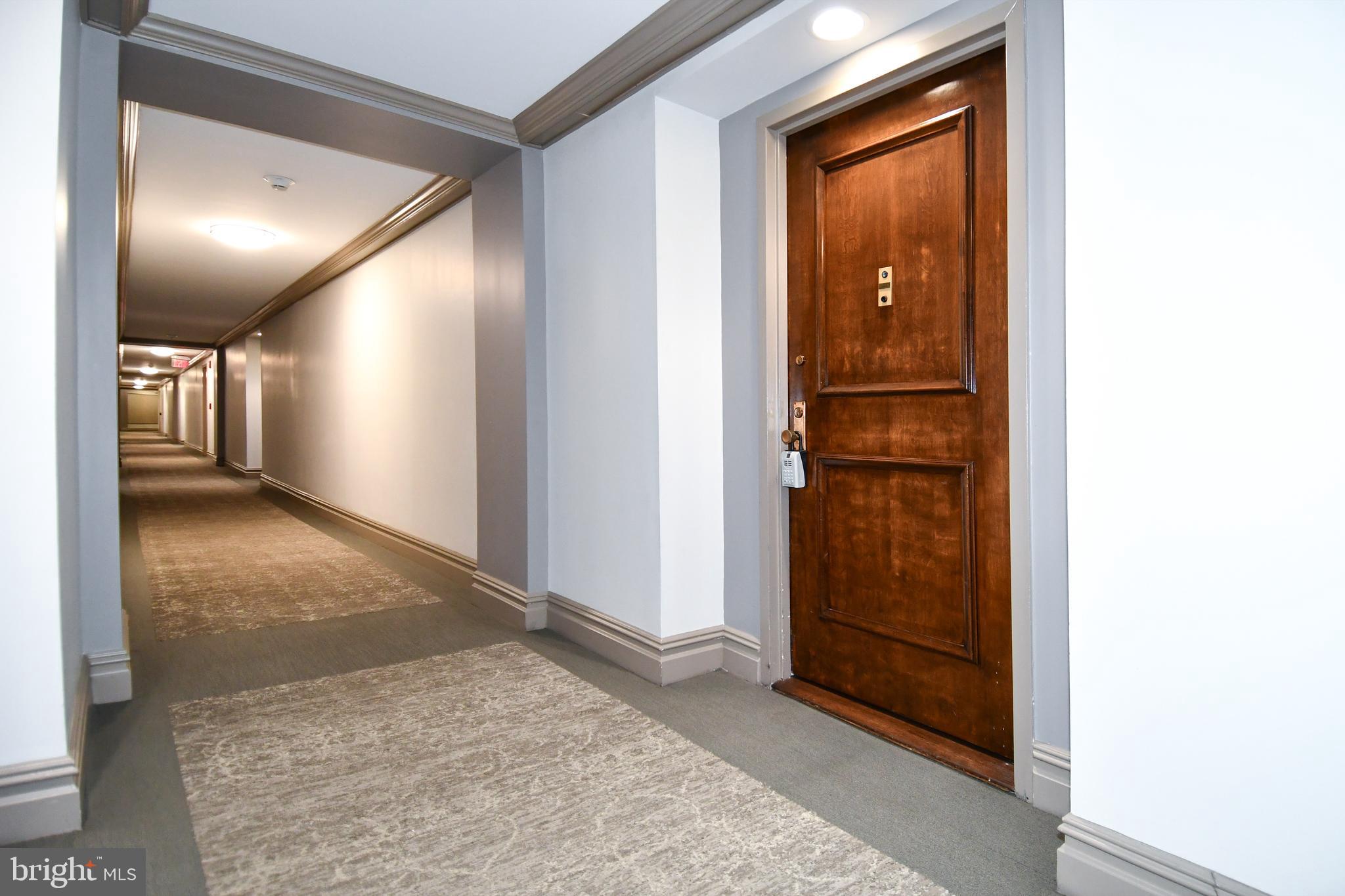 5225 Pooks Hill Road, Unit 222N Bethesda, MD 20814 - Photo 25 of 45 a view of a hallway with some rooms
