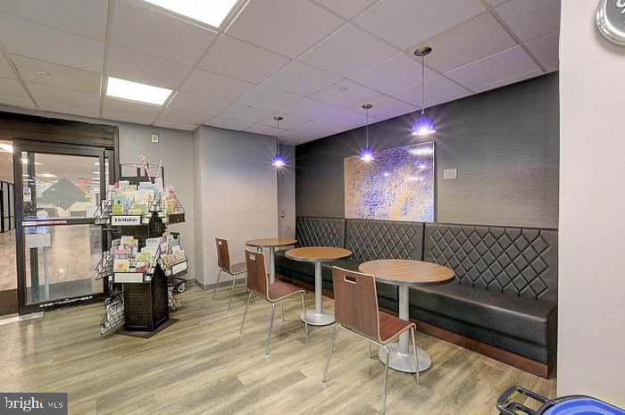 5225 Pooks Hill Road, Unit 222N Bethesda, MD 20814 - Photo 36 of 45 a room with furniture and wooden floor