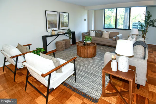 a kitchen with a white stove top oven and white cabinets
