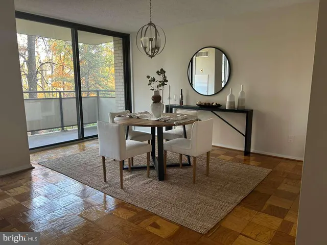 a view of a hallway with some rooms