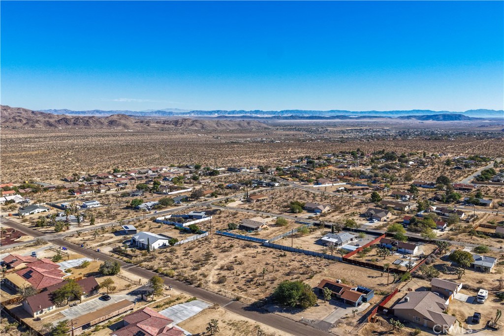 7201 Olympic Road Joshua Tree, CA 92252 - Photo 1 of 12 an aerial view of multiple house