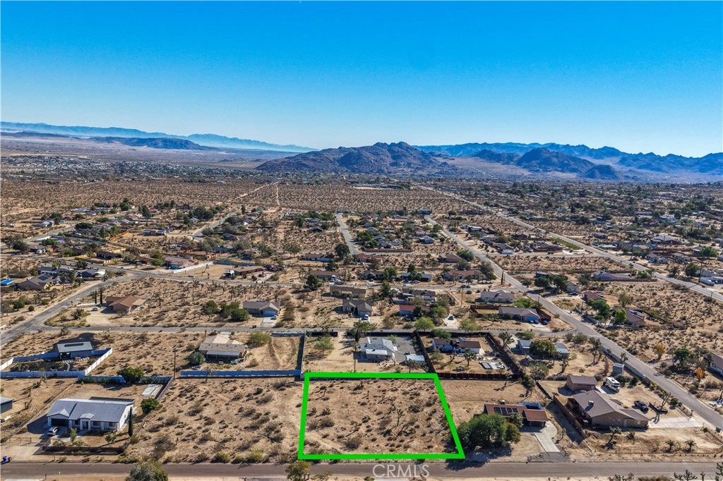 7201 Olympic Road Joshua Tree, CA 92252 - Photo 11 of 12 an aerial view of residential house and green space