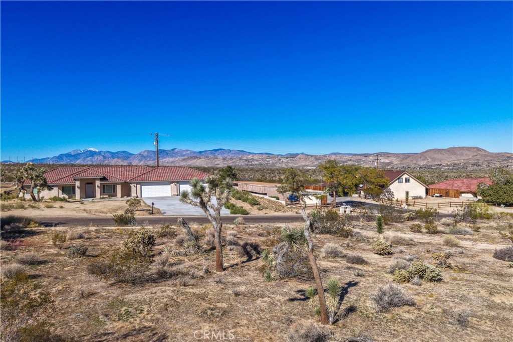 7201 Olympic Road Joshua Tree, CA 92252 - Photo 10 of 12 a view of a lake with a city