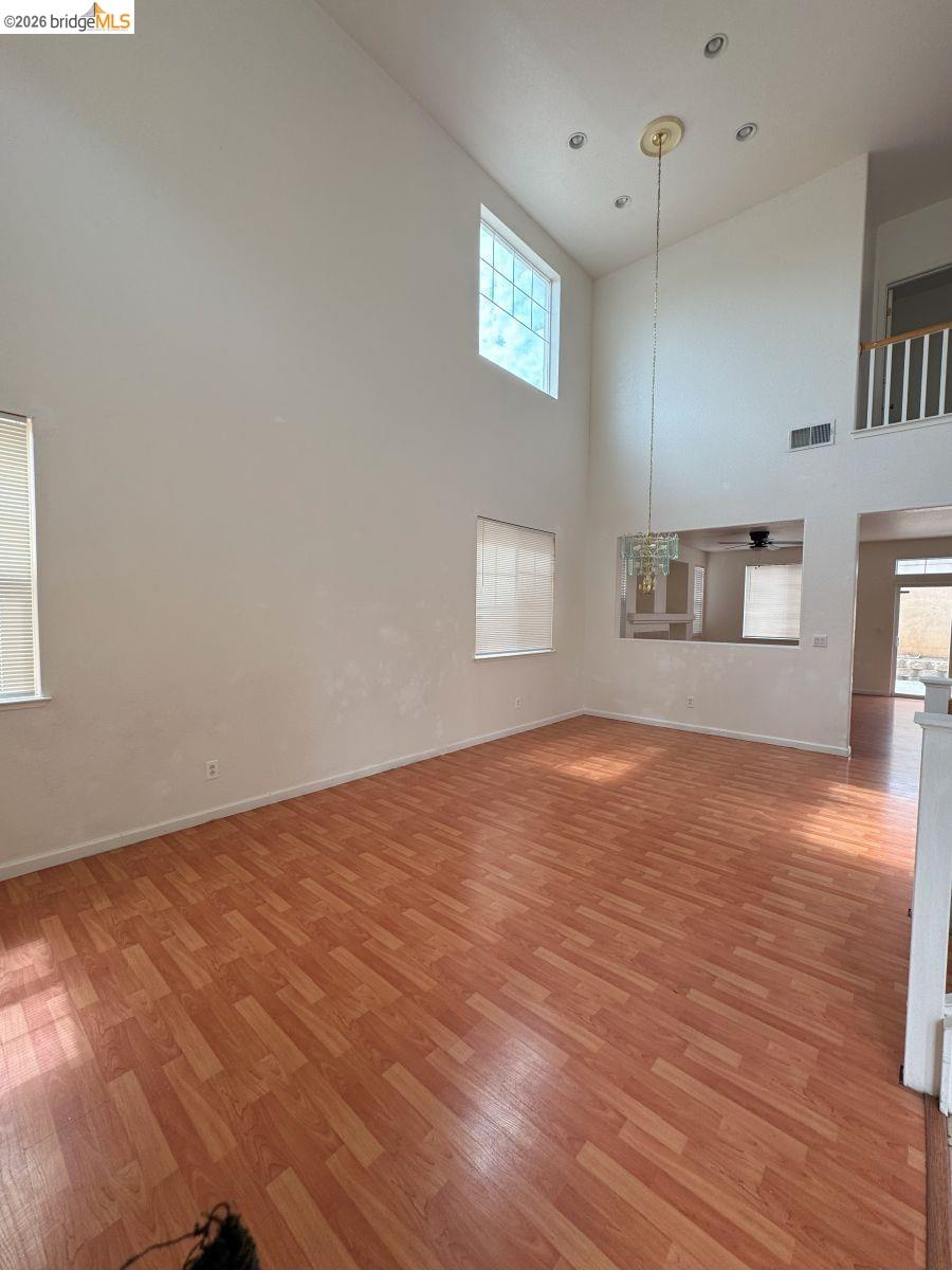645 Rockspray Circle Pittsburg, CA 94565 - Photo 13 of 31 a view of empty room with wooden floor