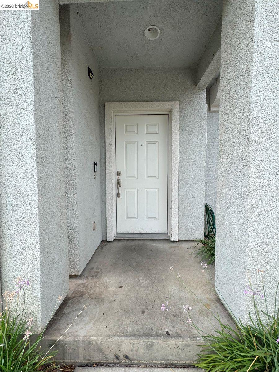 645 Rockspray Circle Pittsburg, CA 94565 - Photo 23 of 31 a view of an empty room and wooden floor