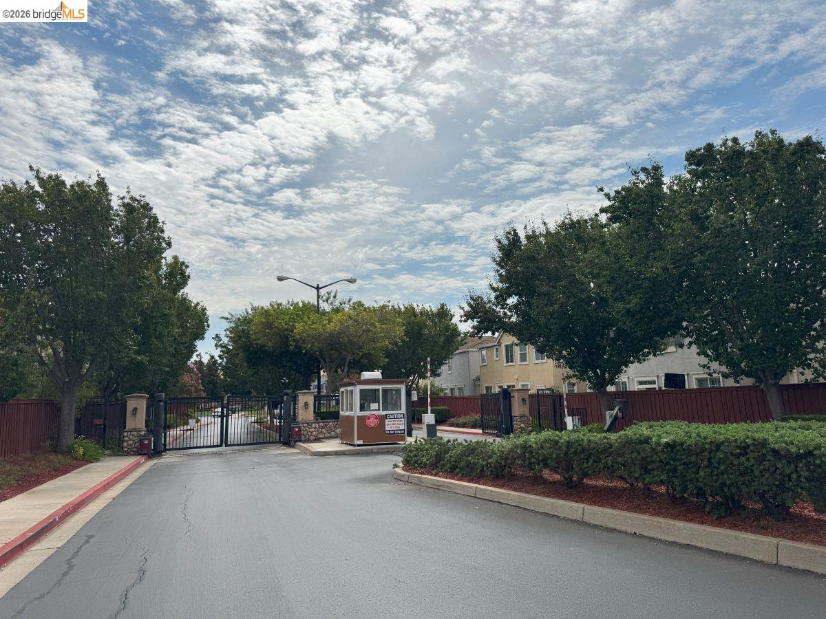 645 Rockspray Circle Pittsburg, CA 94565 - Photo 10 of 31 a city street with lots of buildings and trees