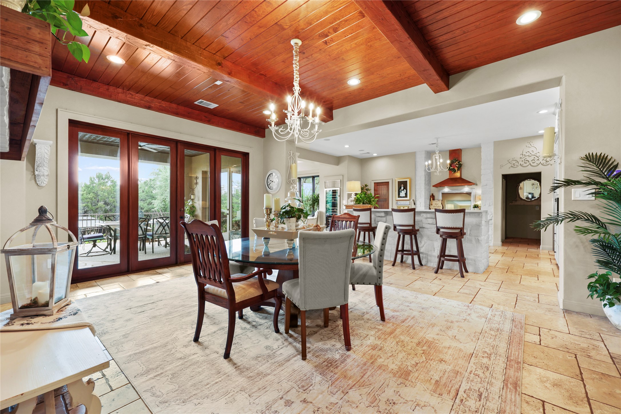 17501 Navigation Lane Lago Vista, TX 78645 - Photo 17 of 40 This expansive room features a high wood-paneled ceiling with exposed beams and recessed lighting