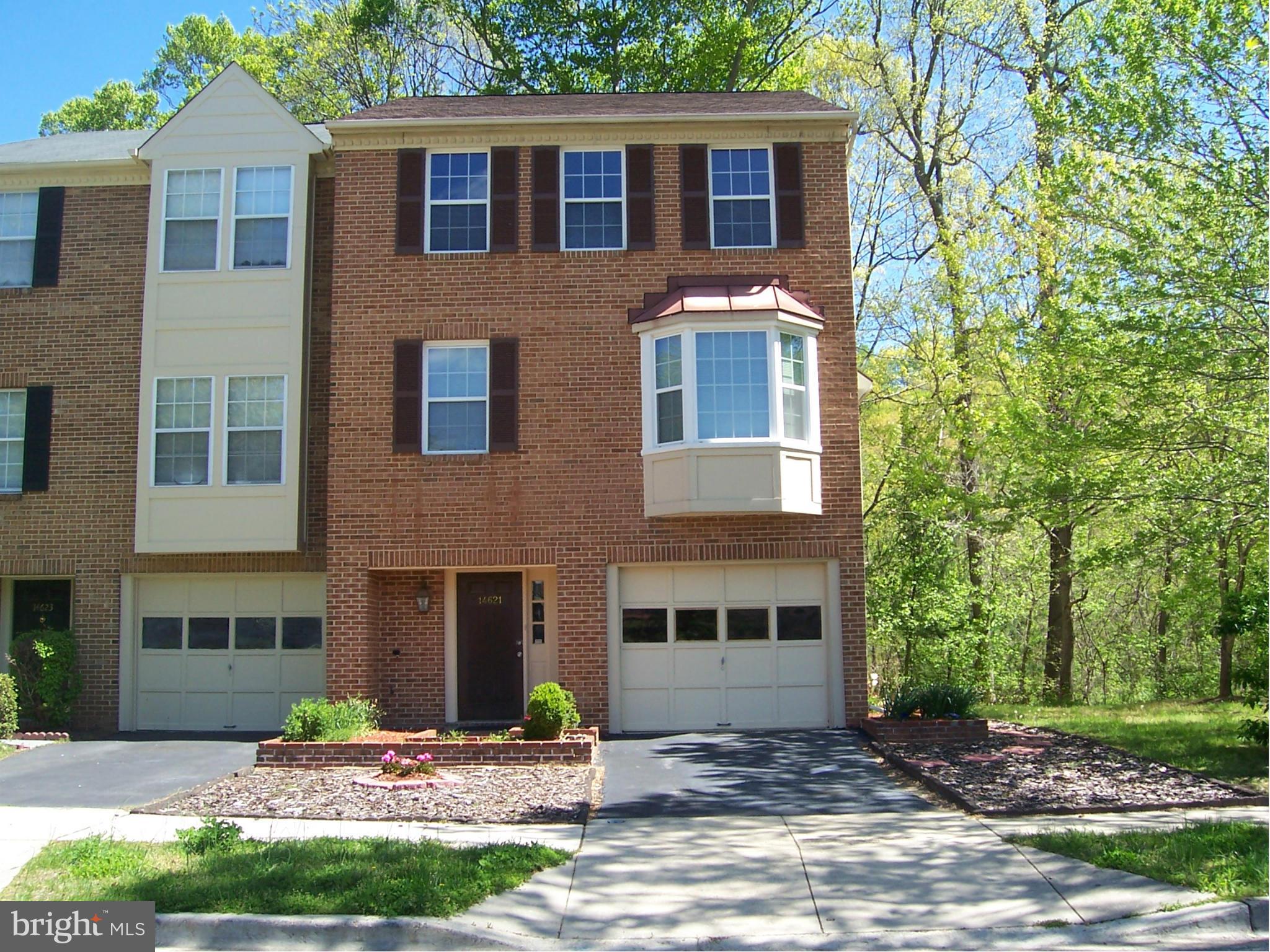 14621 Colonels Choice Road Upper Marlboro, MD 20772 - Photo 1 of 25 a front view of a house with a yard