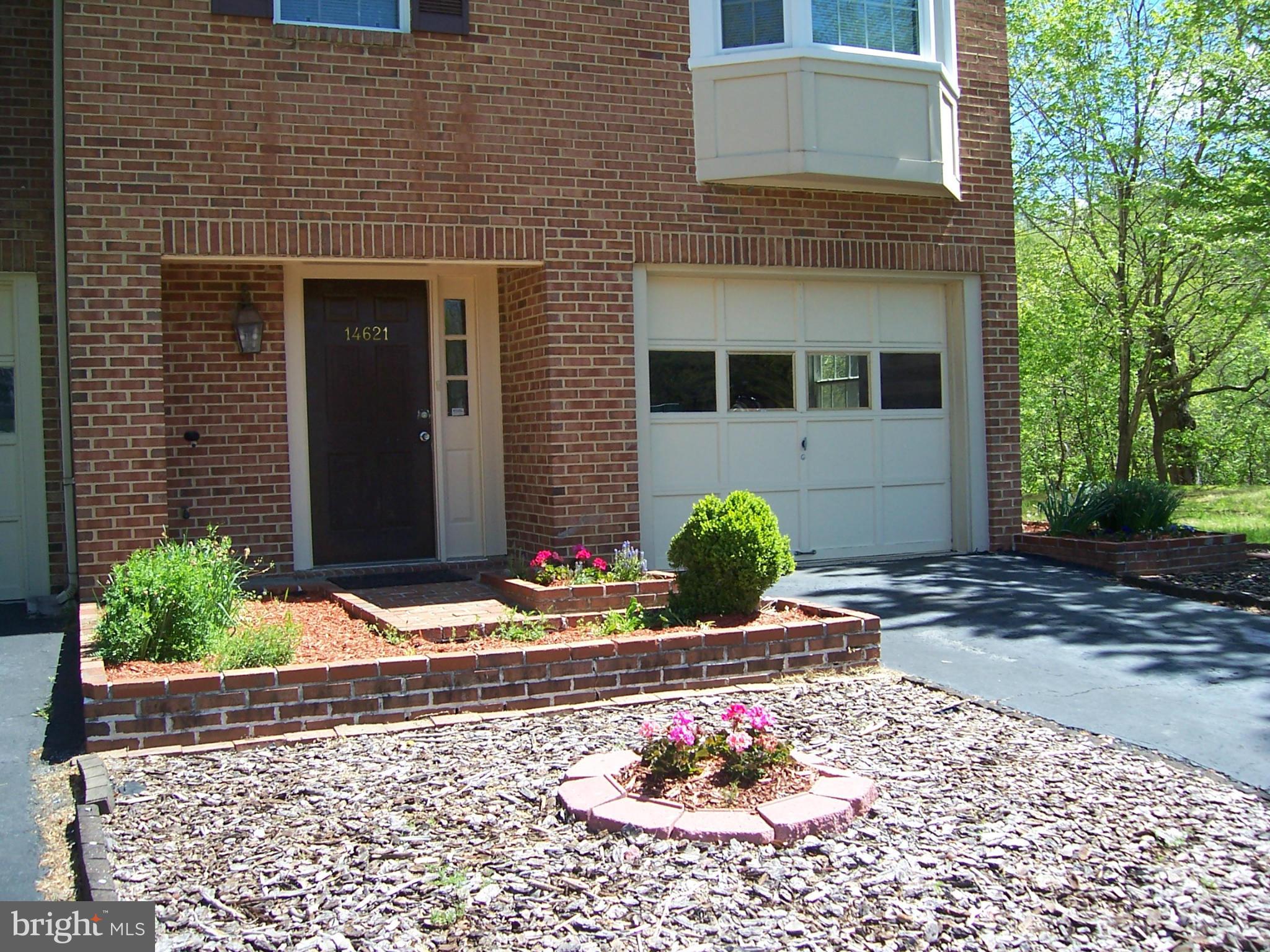 14621 Colonels Choice Road Upper Marlboro, MD 20772 - Photo 11 of 25 a front view of a house with a yard