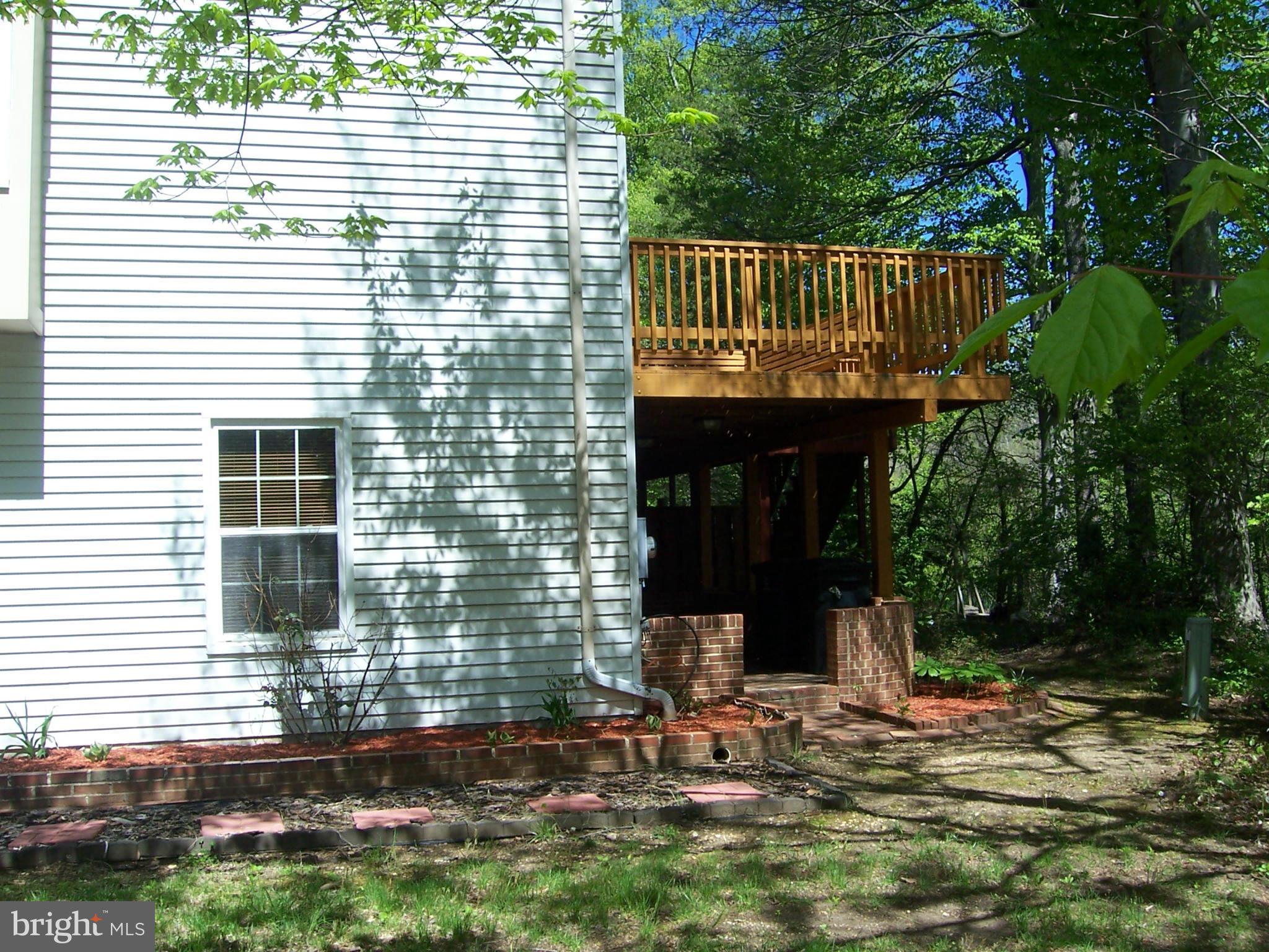14621 Colonels Choice Road Upper Marlboro, MD 20772 - Photo 15 of 25 a view of a house with backyard and sitting area