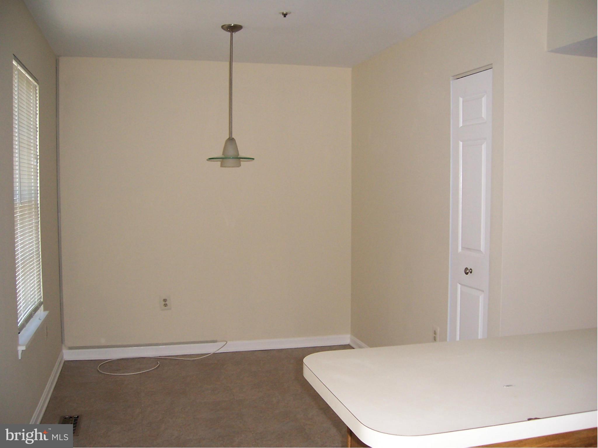 14621 Colonels Choice Road Upper Marlboro, MD 20772 - Photo 16 of 25 a view of a room with a white wall and sink