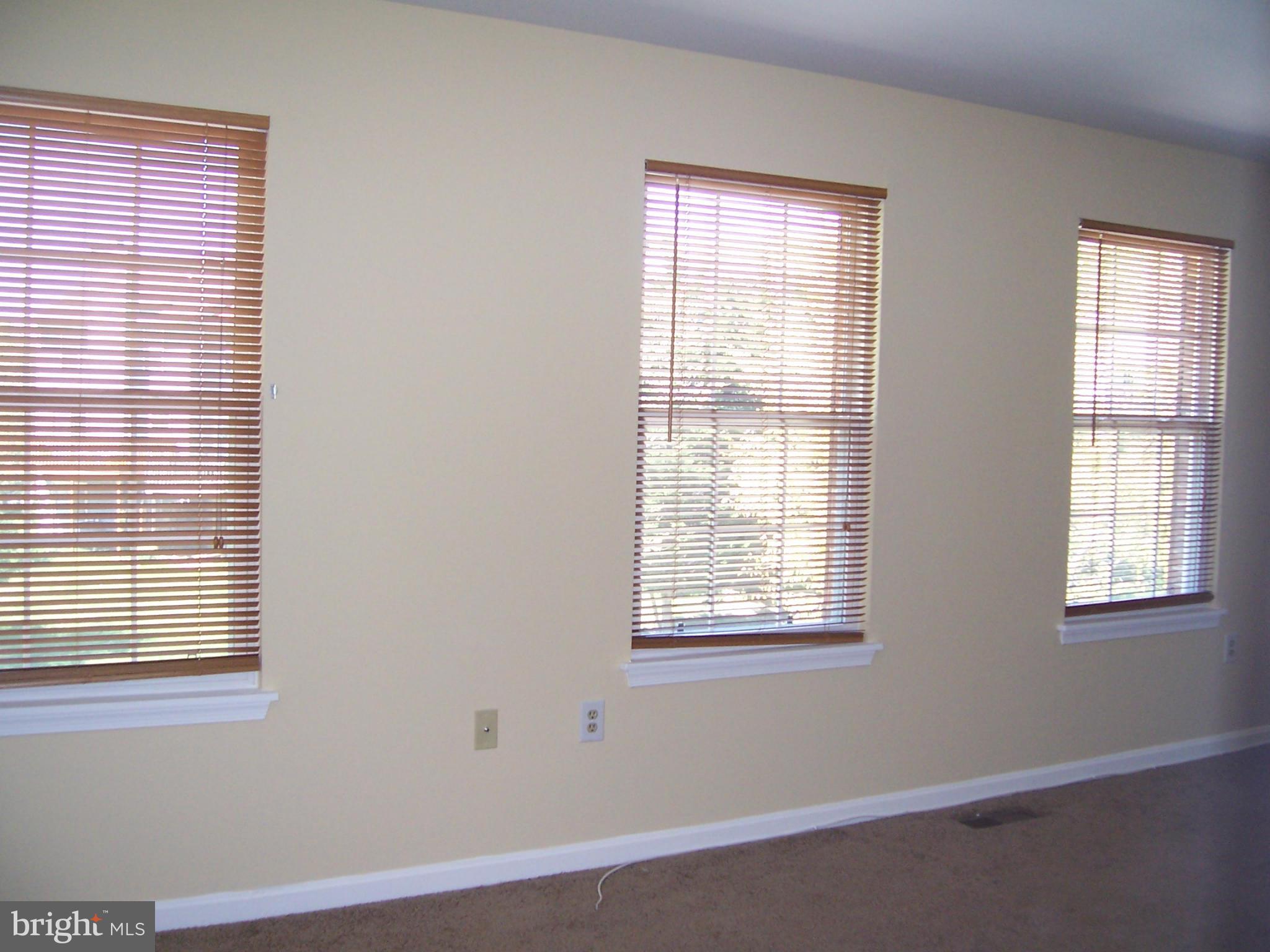 14621 Colonels Choice Road Upper Marlboro, MD 20772 - Photo 17 of 25 a view of an empty room with a window