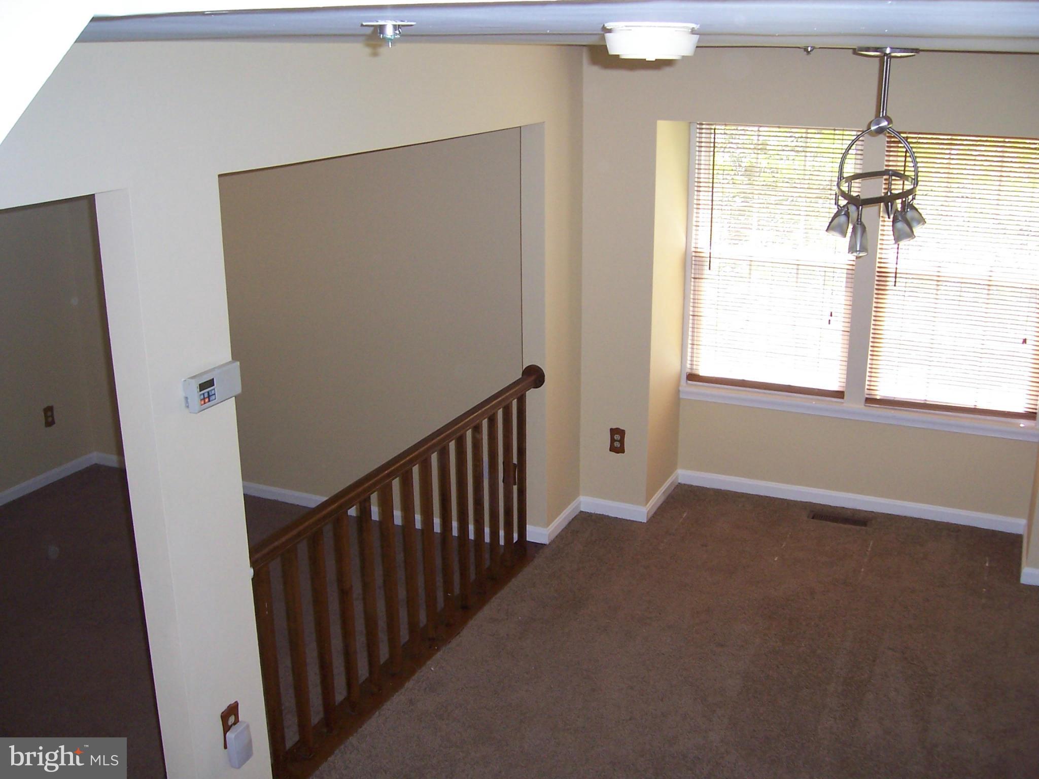 14621 Colonels Choice Road Upper Marlboro, MD 20772 - Photo 23 of 25 a view of hallway with windows