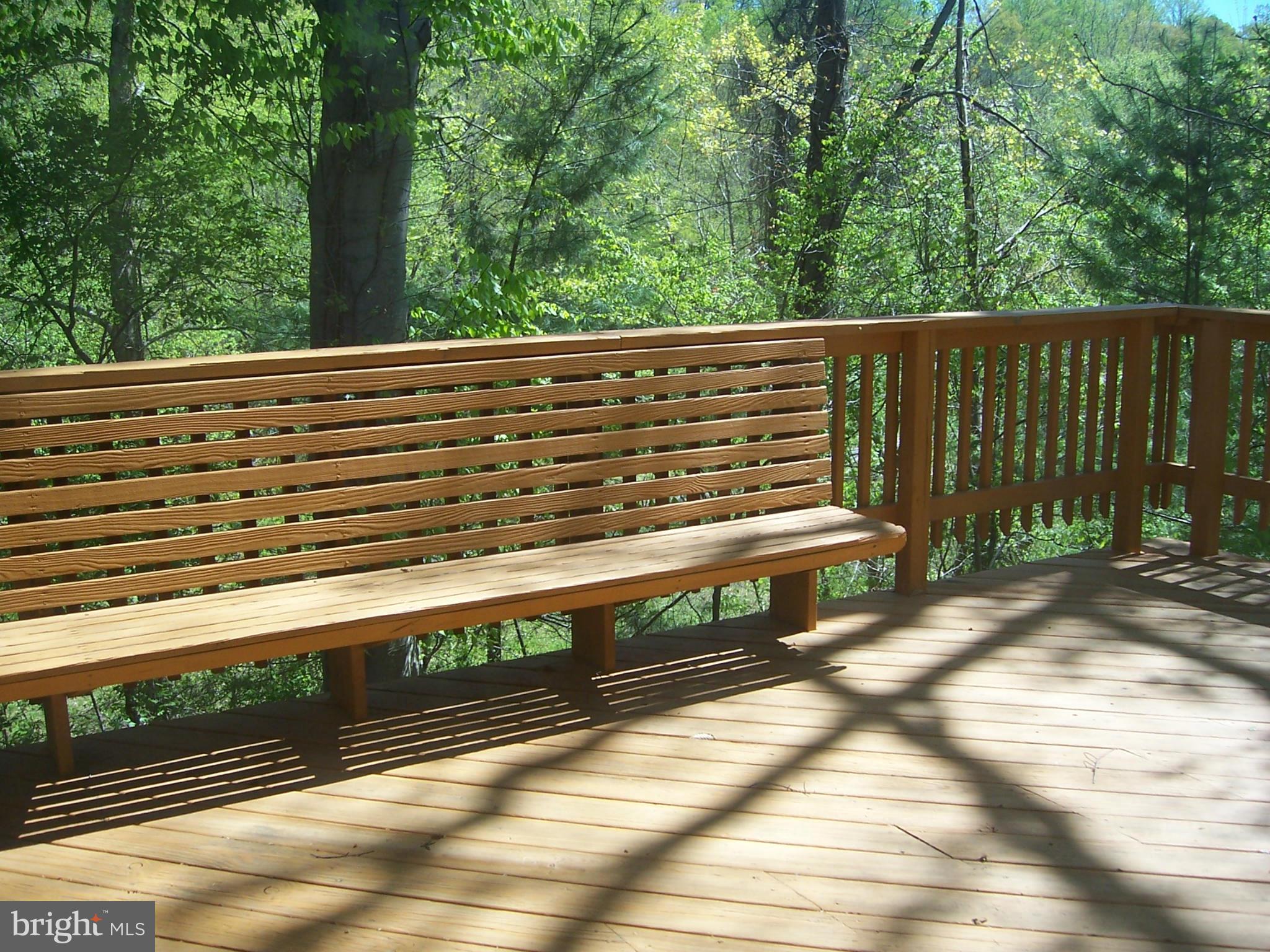 14621 Colonels Choice Road Upper Marlboro, MD 20772 - Photo 25 of 25 a view of a wooden bench next to a yard