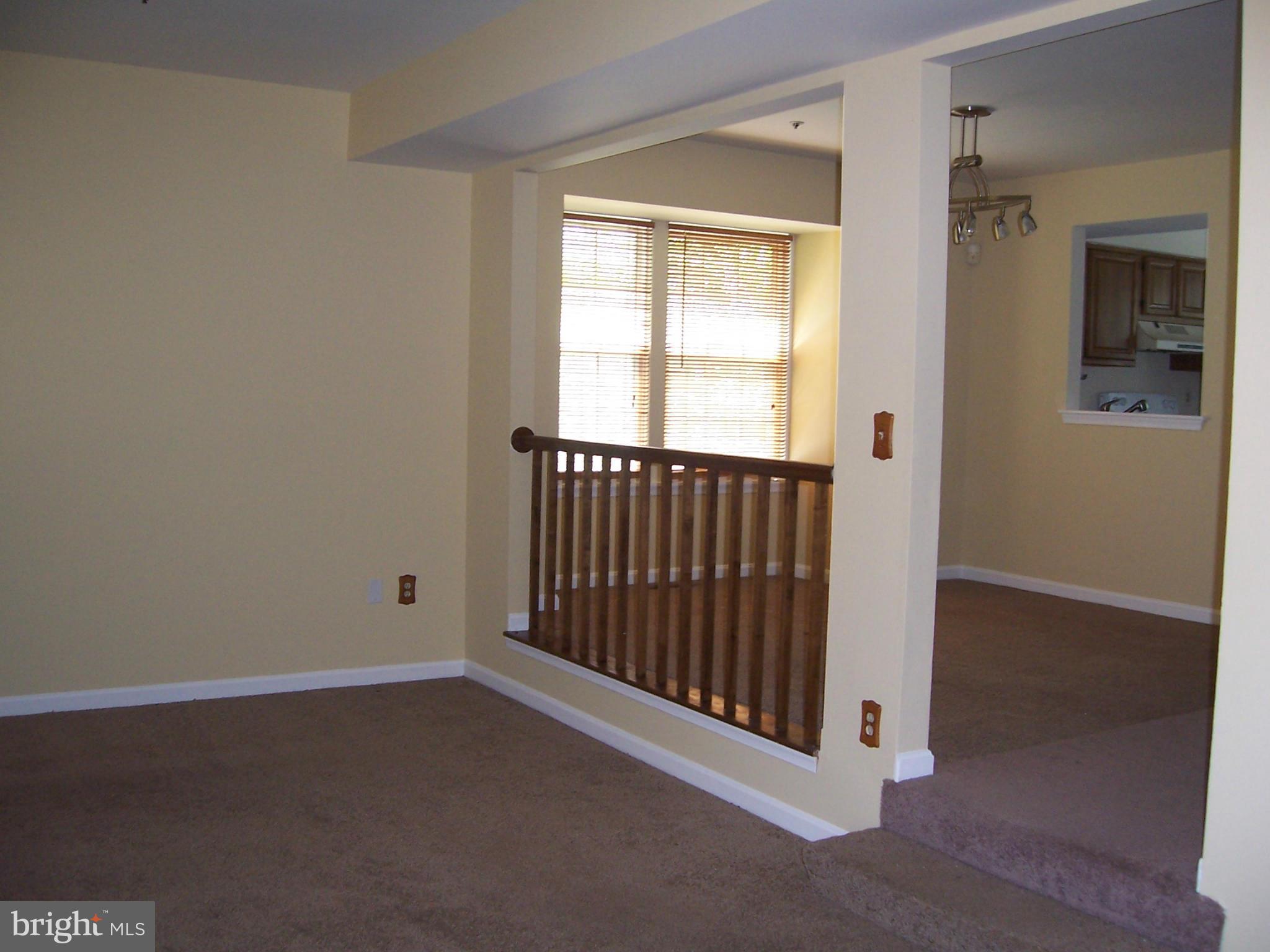 14621 Colonels Choice Road Upper Marlboro, MD 20772 - Photo 4 of 25 an empty room with windows