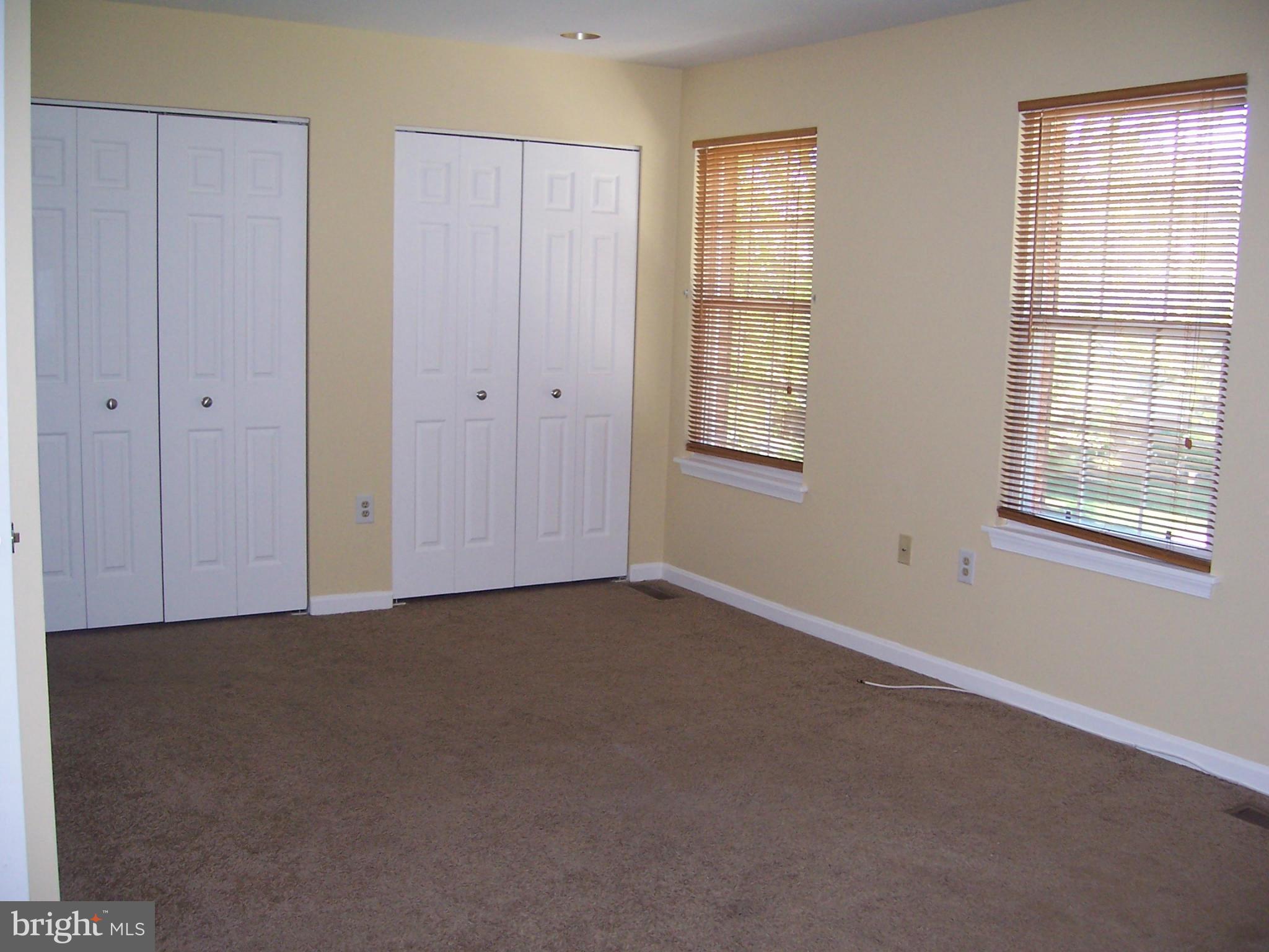 14621 Colonels Choice Road Upper Marlboro, MD 20772 - Photo 7 of 25 a view of an empty room with a window