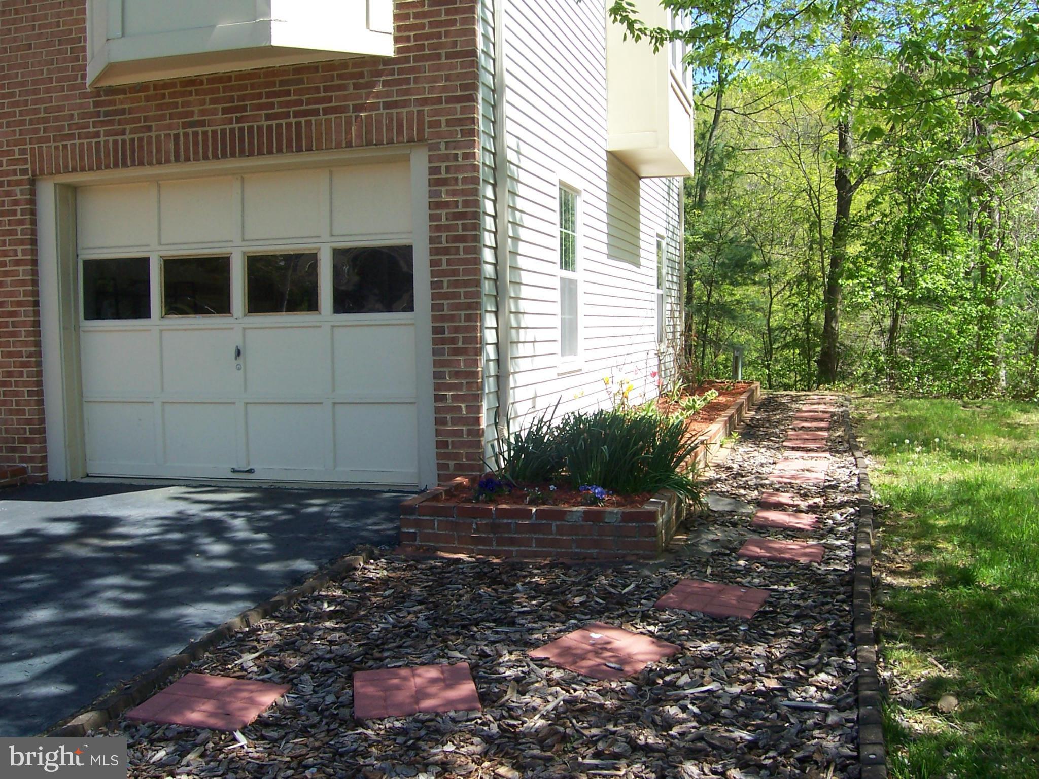 14621 Colonels Choice Road Upper Marlboro, MD 20772 - Photo 9 of 25 a view of a house with a yard