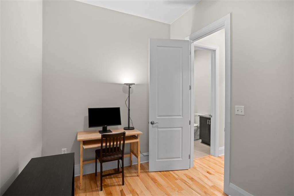 301 Fifth Avenue, Unit 606 Pittsburgh, PA 15222 - Photo 18 of 27 a view of a workspace with furniture