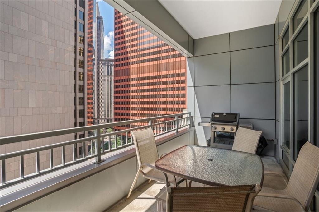 301 Fifth Avenue, Unit 606 Pittsburgh, PA 15222 - Photo 22 of 27 a view of a balcony with chairs
