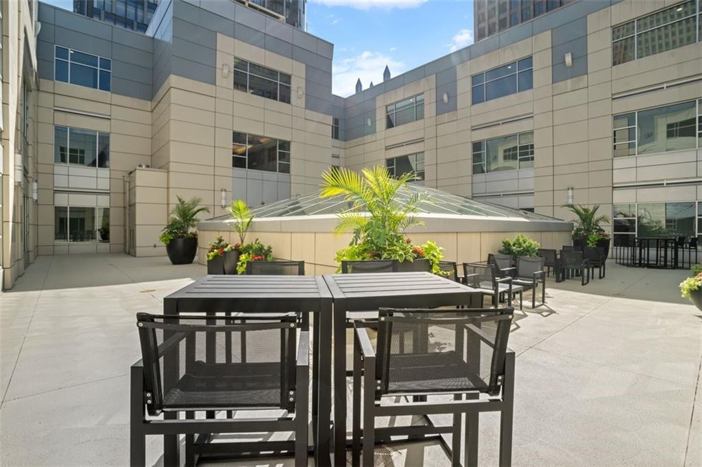 301 Fifth Avenue, Unit 606 Pittsburgh, PA 15222 - Photo 27 of 27 a view of a chairs and table in the patio