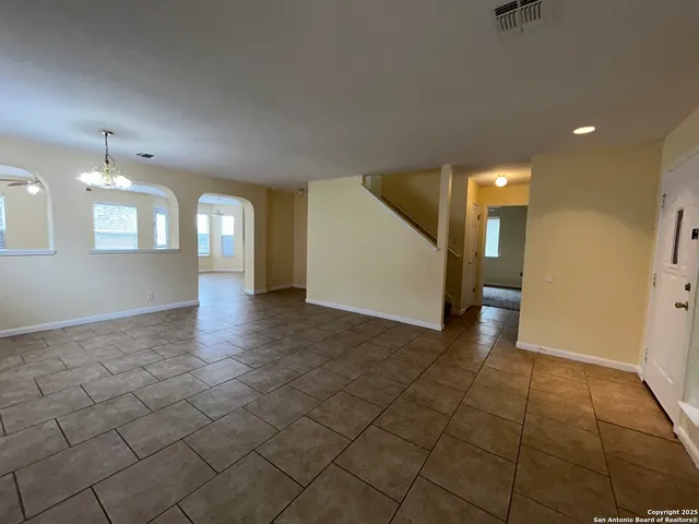 a view of a hallway with entryway