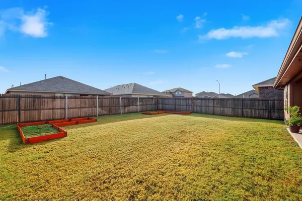 a swimming pool with wooden fence