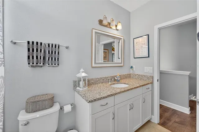 an aerial view of a house with a garden and plants