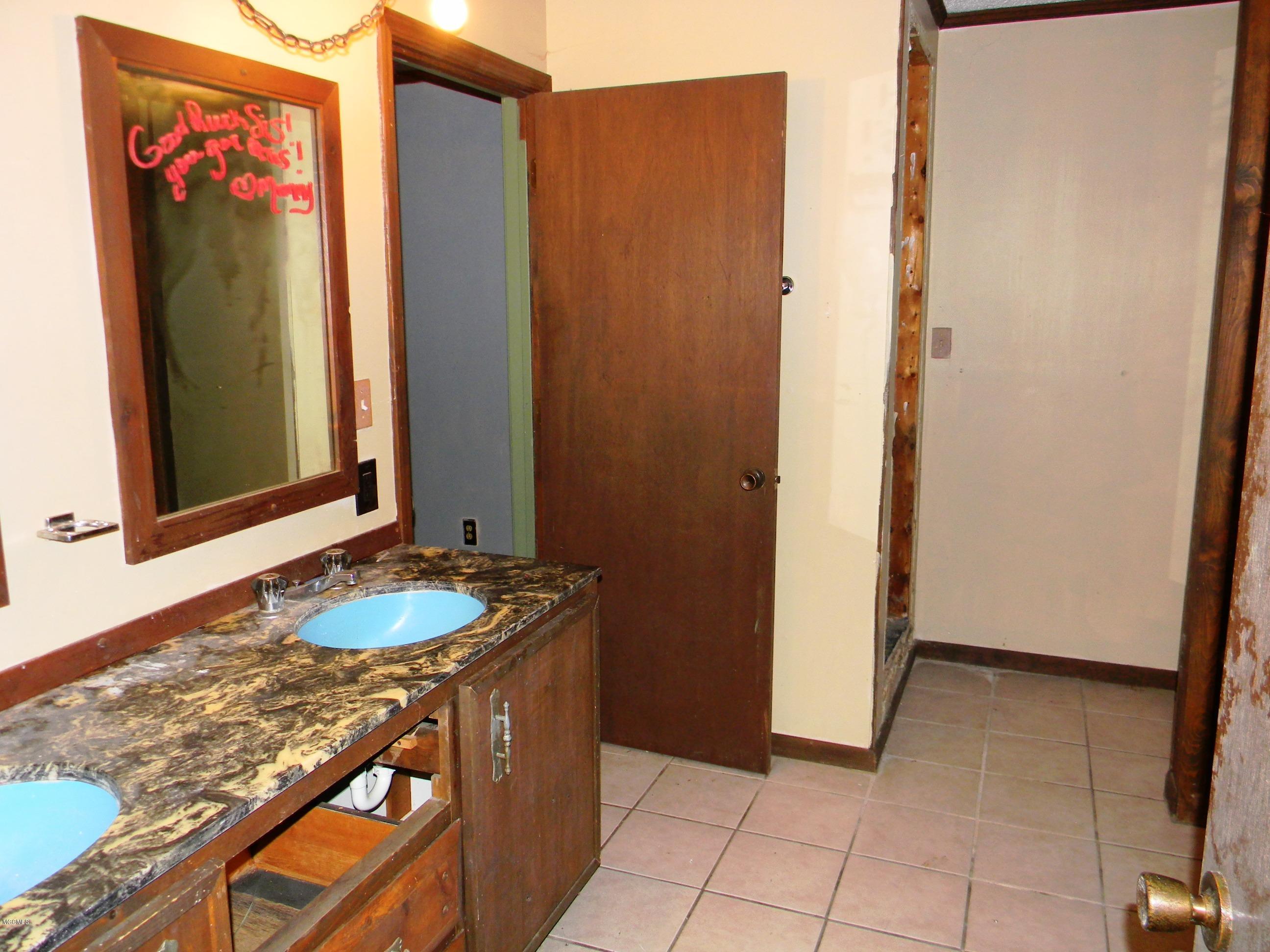 14355 Dedeaux Road Gulfport, MS 39503 - Photo 11 of 19 Bathroom