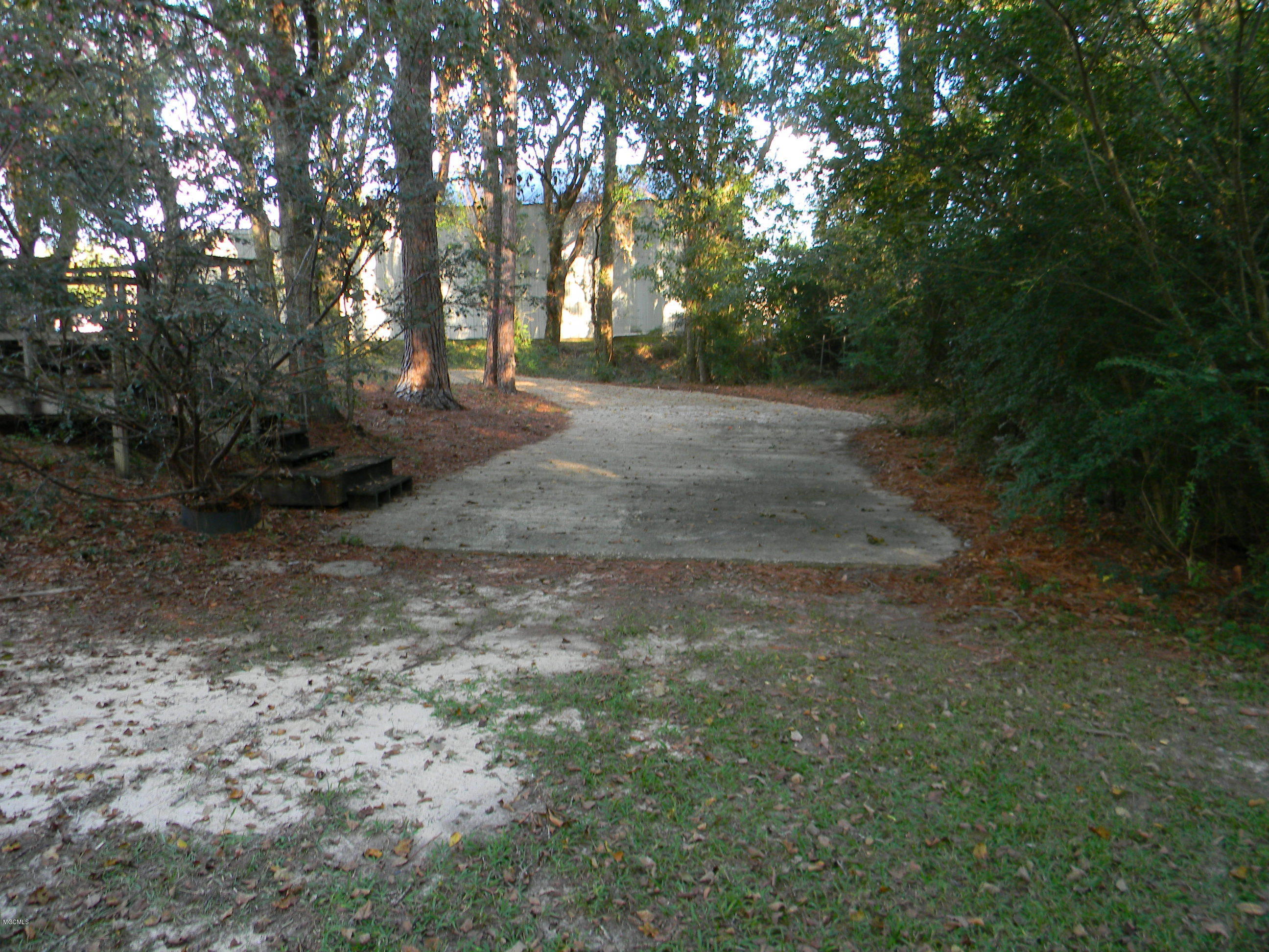 14355 Dedeaux Road Gulfport, MS 39503 - Photo 17 of 19 Back driveway