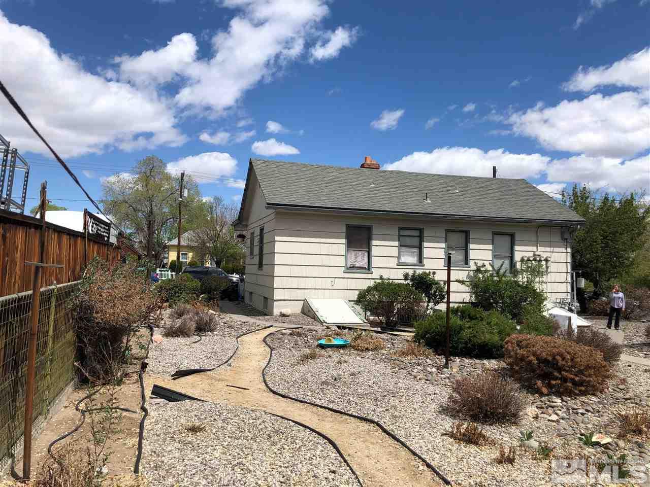841-843 & 845 Ralston Reno, NV 89503 - Photo 10 of 19 a front view of house with yard outdoor seating and barbeque oven