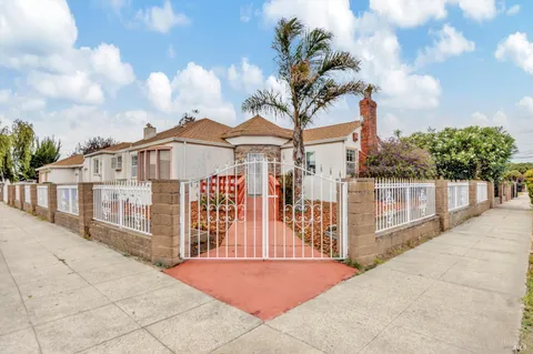a view of a house with wooden stairs