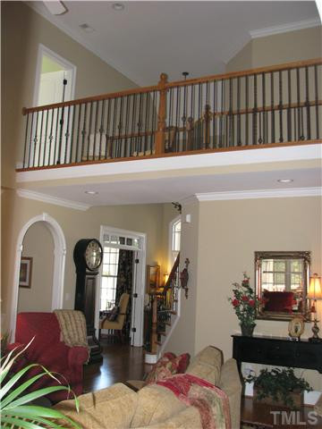 7300 Sparhawk Road Wake Forest, NC 27587 - Photo 9 of 12 VIew from Breakfast area showing the catwalk between the upstairs bedrooms. Den/Family/Great Room