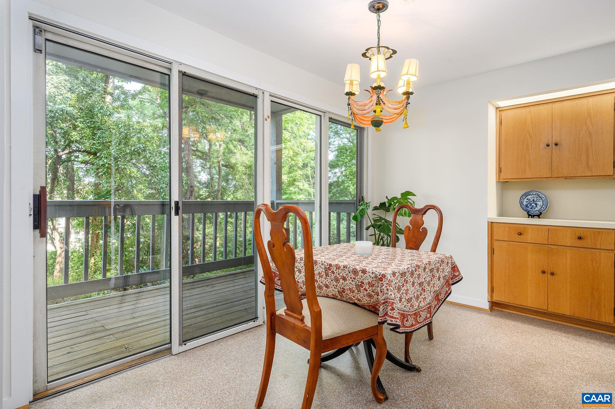 207 2nd Street Northwest, Unit D Charlottesville, VA 22902 - Photo 9 of 18 a dining room table furniture and window