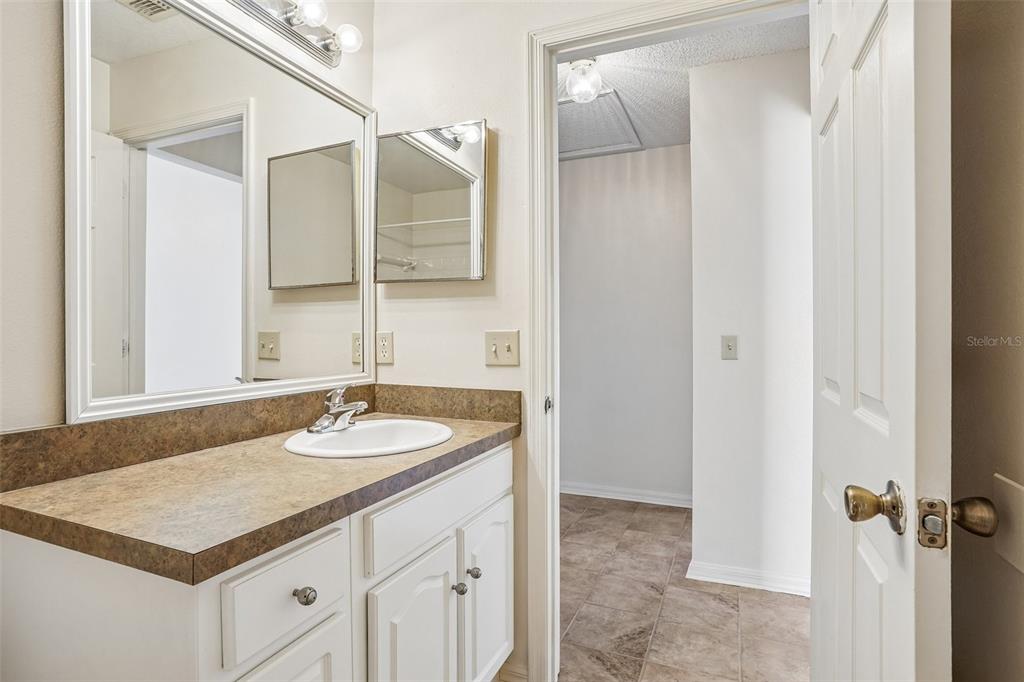 2596 Alclobe Circle Ocoee, FL 34761 - Photo 45 of 70 a bathroom with a sink and a mirror
