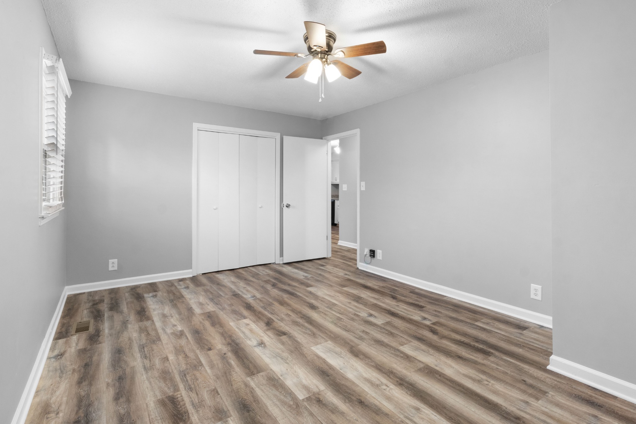 2251 7 Mile Ferry Road, Unit 9 Clarksville, TN 37040 - Photo 13 of 26 a view of a room with a ceiling fan and a window