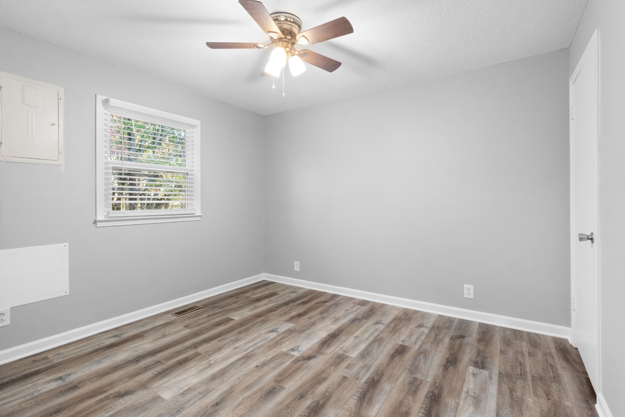 2251 7 Mile Ferry Road, Unit 9 Clarksville, TN 37040 - Photo 17 of 26 wooden floor in an empty room with a window