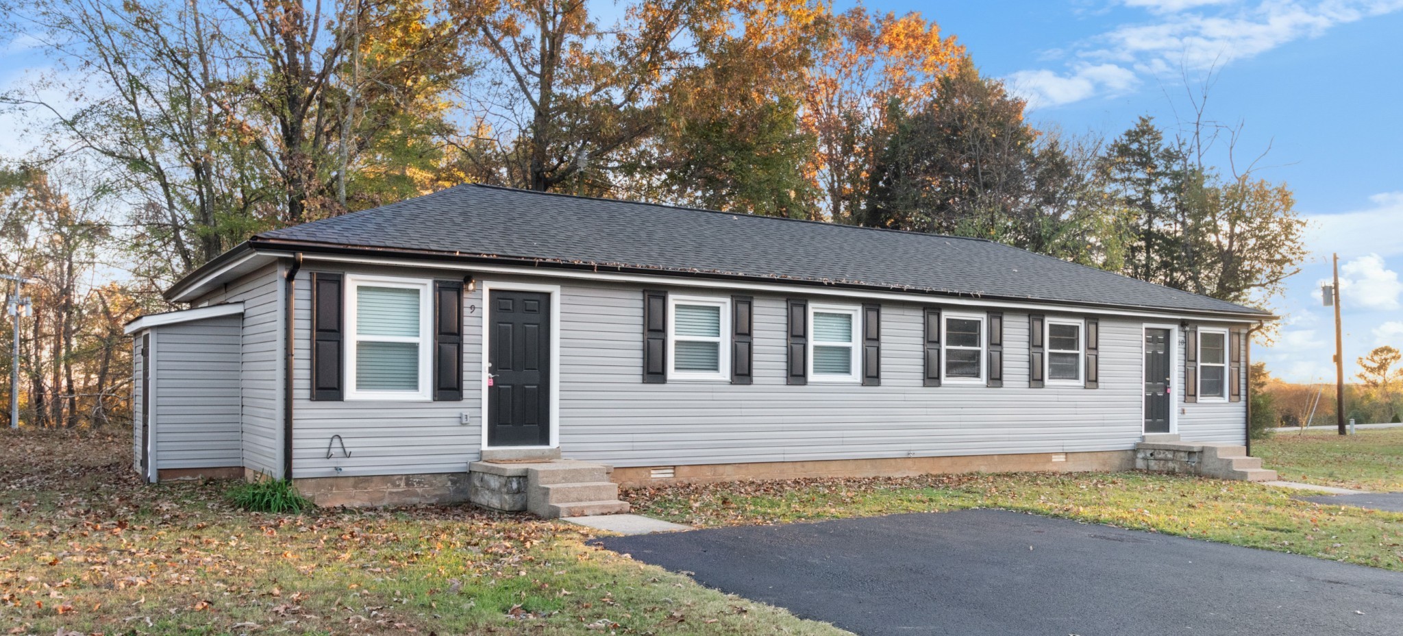 2251 7 Mile Ferry Road, Unit 9 Clarksville, TN 37040 - Photo 4 of 26 a front view of a house with a yard