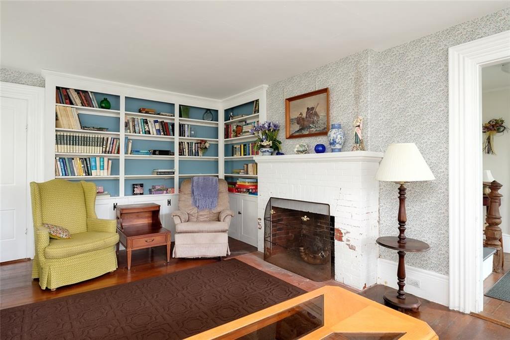 755 Shore Road Cape Neddick, ME 03902 - Photo 21 of 35 This room has a woodburning...