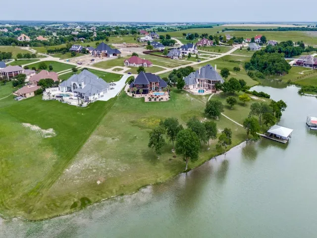 a view of a table and chairs in the patio