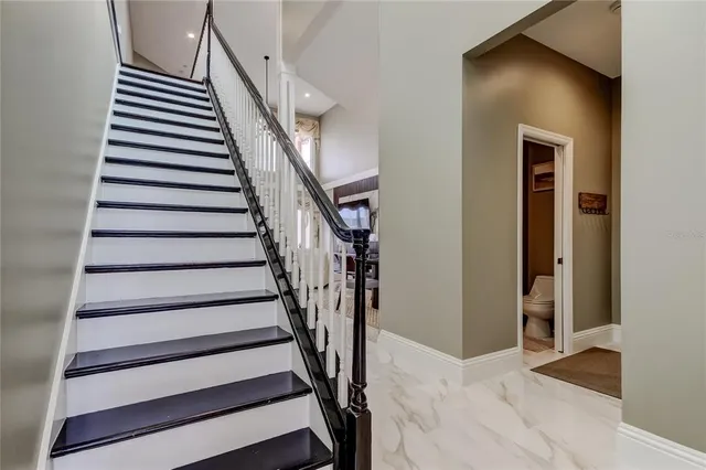 a view of entryway with wooden floor