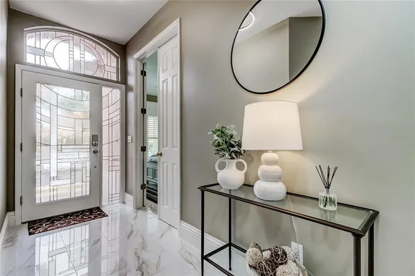 a room with furniture and wooden floor