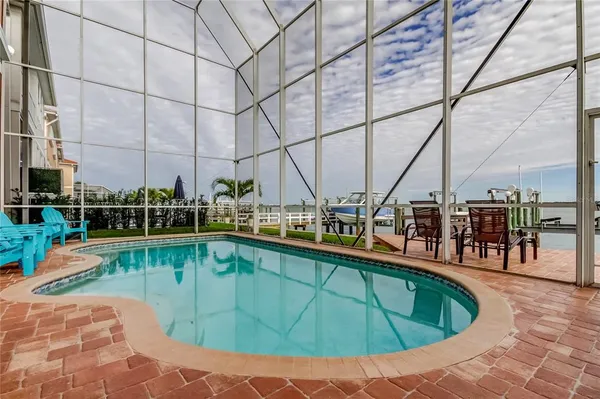 a view of a swimming pool with a lake view