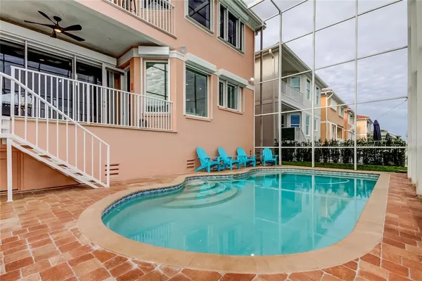 a view of a house with swimming pool