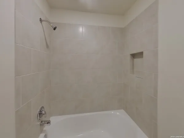 a bathroom with a bathtub