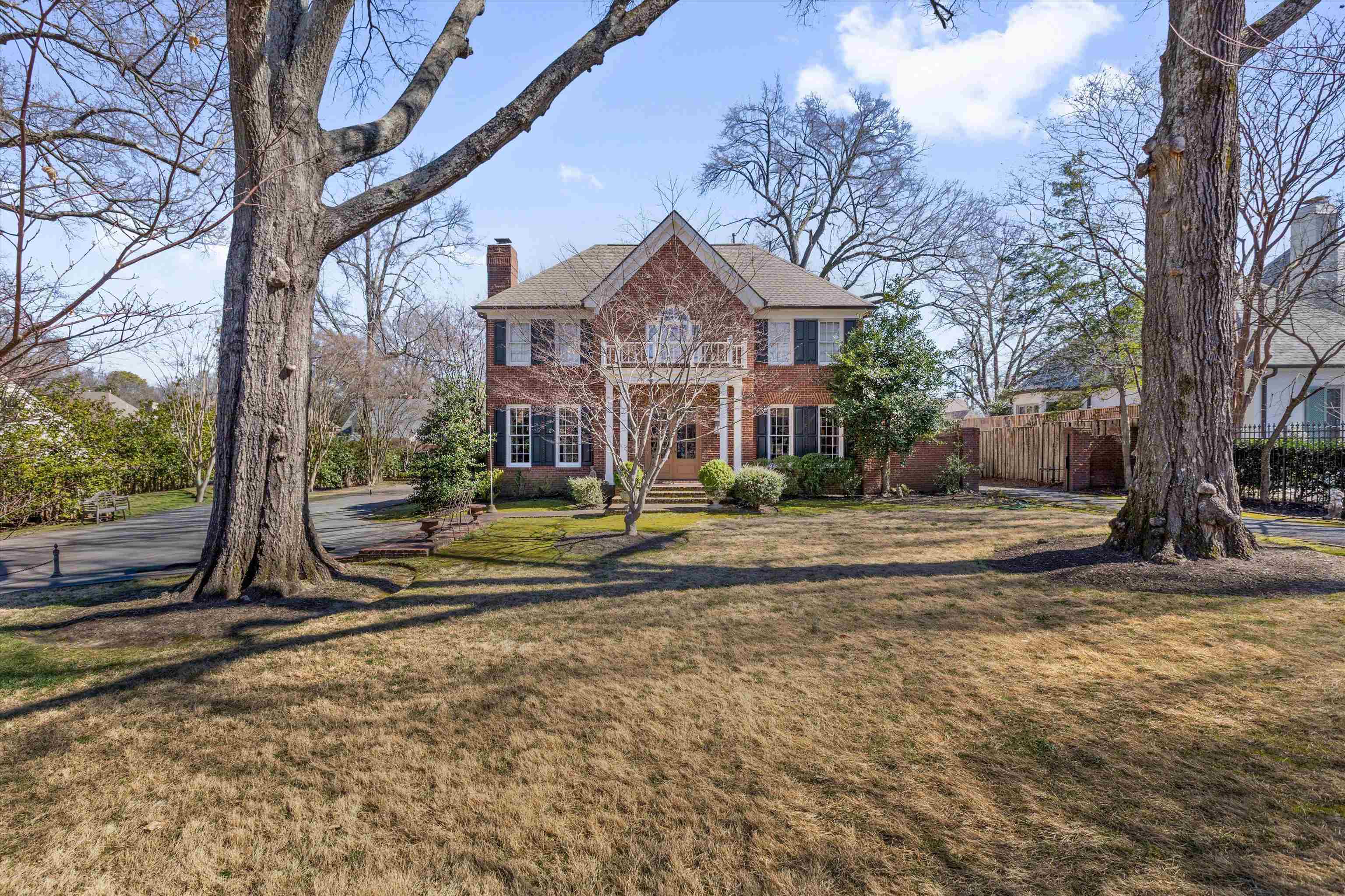 400 Colonial Road Memphis, TN 38117 - Photo 2 of 40 a front view of a house with a yard